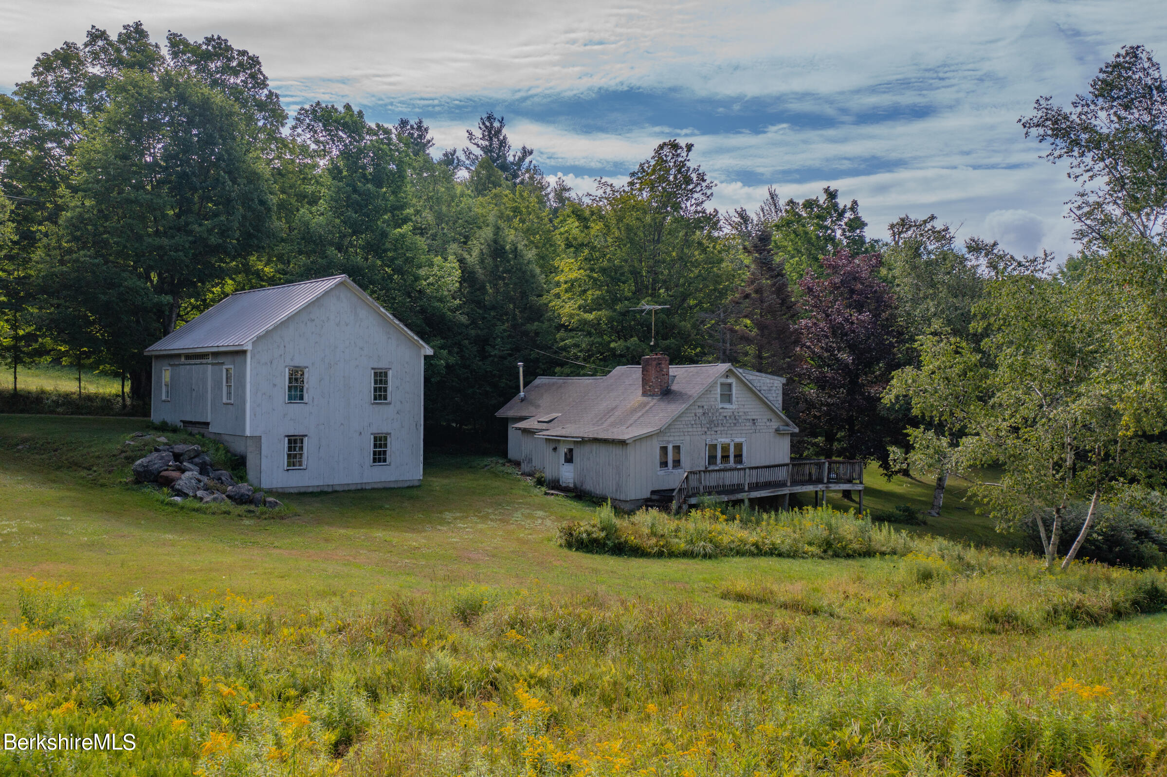 147 Sumner Stetson Road Heath, MA 01339 - Photo 28 of 37 a aerial view of a house with yard and tree in the background