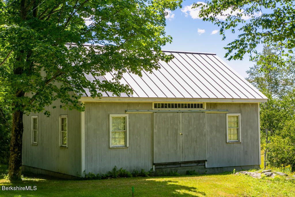 147 Sumner Stetson Road Heath, MA 01339 - Photo 29 of 37 a view of a house with a swimming pool