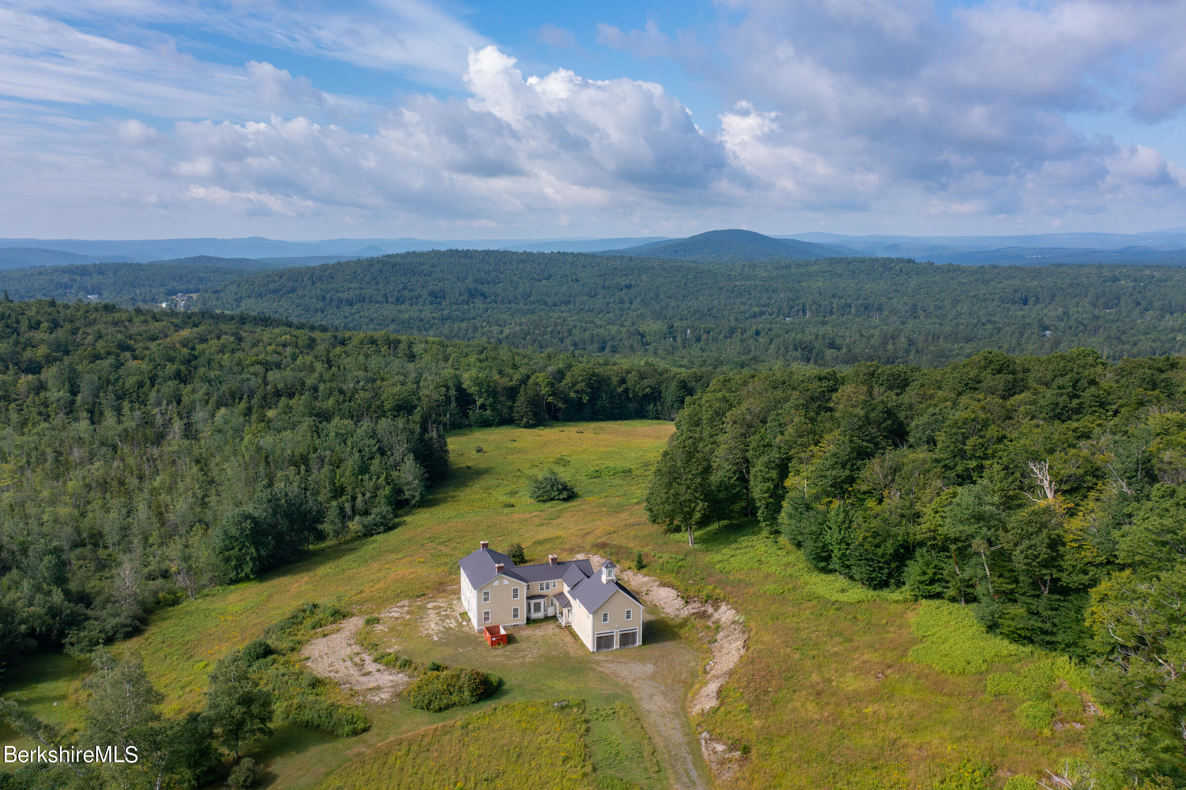 147 Sumner Stetson Road Heath, MA 01339 - Photo 4 of 37 a view of a city with lush green forest