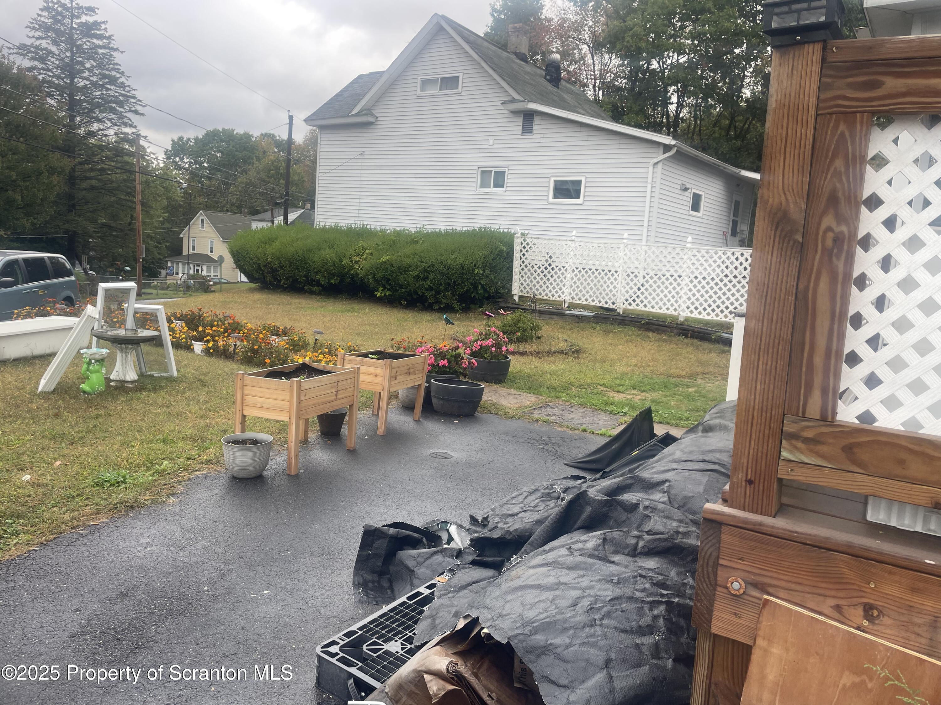 42 Upper Powderly Street Carbondale, PA 18407 - Photo 2 of 7 a view of a terrace with chairs