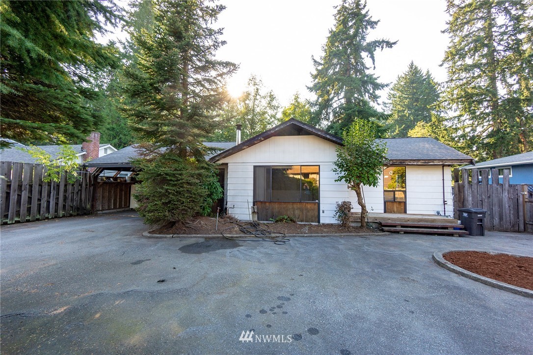 6618 Willow Road Everett, WA 98203 - Photo 1 of 15 a view of a house with a yard and sitting area
