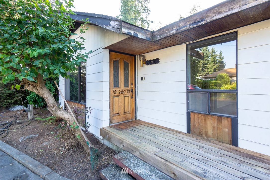 6618 Willow Road Everett, WA 98203 - Photo 3 of 15 a front view of a house with a yard