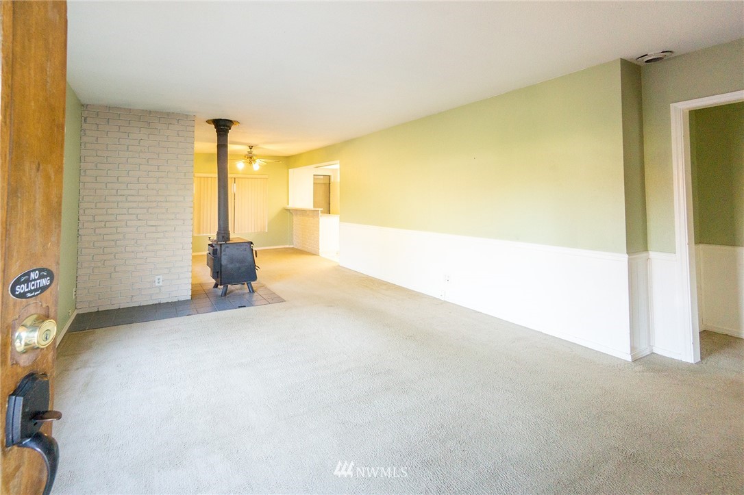 6618 Willow Road Everett, WA 98203 - Photo 4 of 15 a view of an empty room and a window