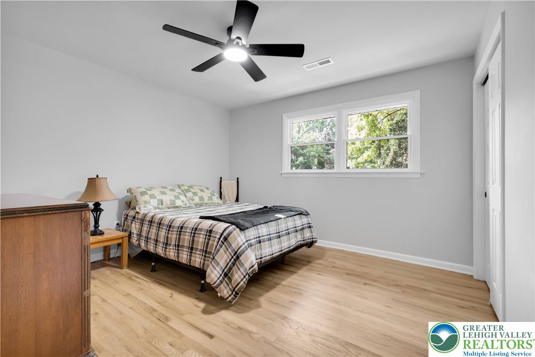 2011 Greenwood Road Allentown, PA 18103 - Photo 24 of 52 Hardwood floors and a ceiling fan create a comfortable and inviting bedroom retreat.