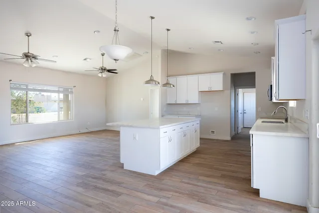 a view of a bedroom from a hallway