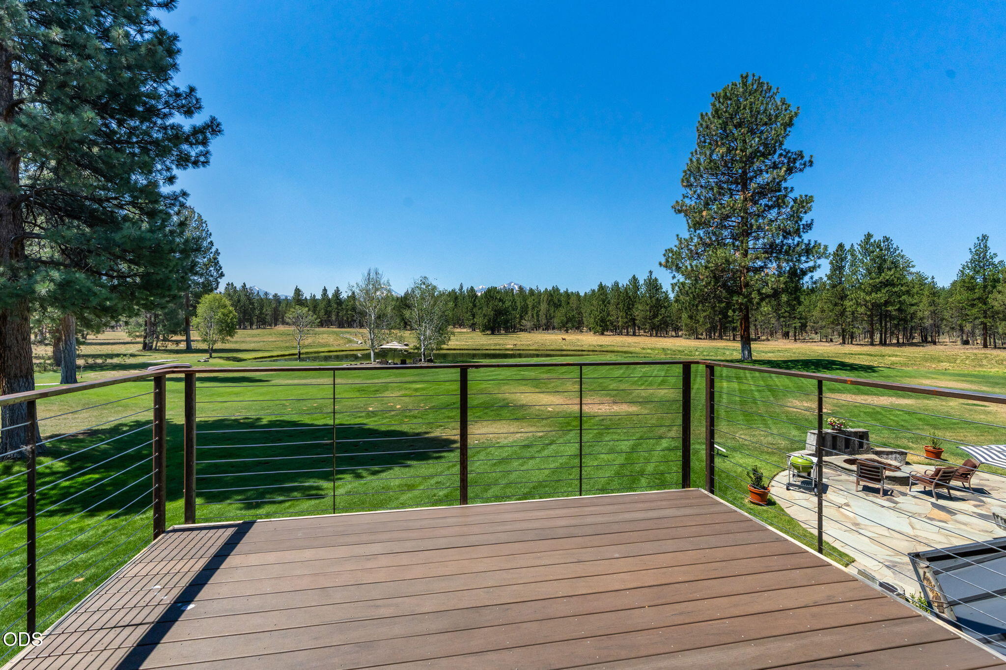 67376 Peterson Mill Road Sisters, OR 97759 - Photo 62 of 72 a view of a deck with yard and lake view