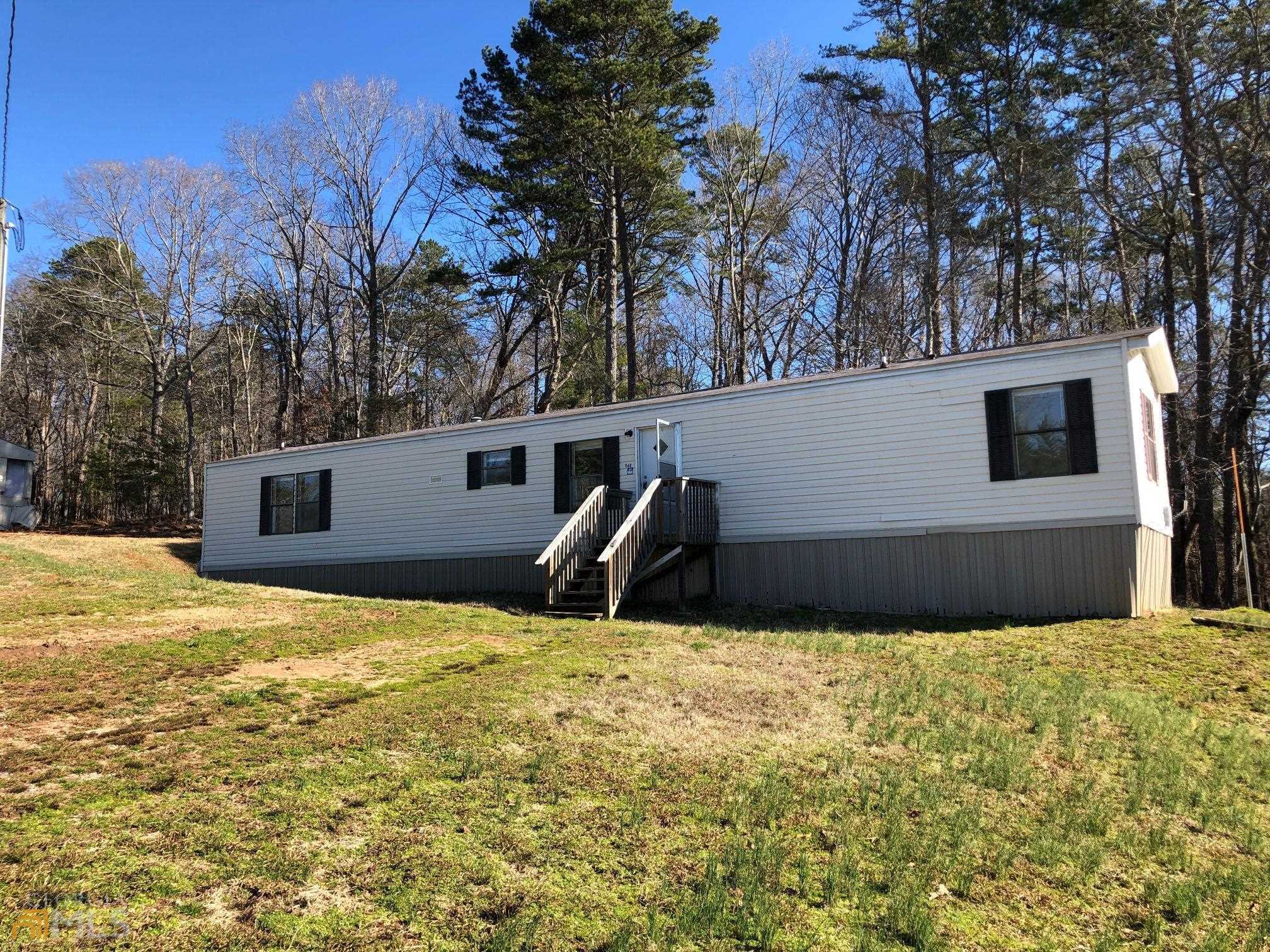 1560 Grindle Bridge Road Dahlonega, GA 30533 - Photo 1 of 1 a view of a backyard of the house