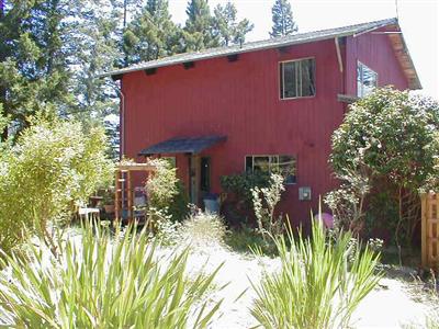 35840 Tan Bark Road Gualala, CA 95445 - Photo 2 of 7 a view of a house with a yard