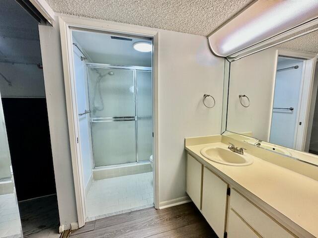 18730 Stewart Circle, Unit 5 Boca Raton, FL 33496 - Photo 6 of 24 a bathroom with a sink a tub and a mirror