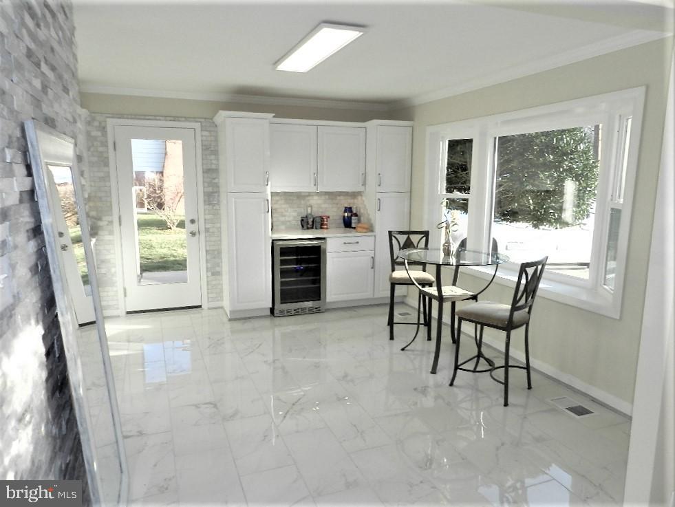 213 Beaumont Road Silver Spring, MD 20904 - Photo 4 of 39 Fabulous 12X24 Calacatta Porcelain floors