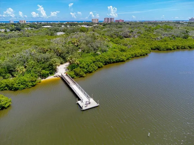 a view of a lake and a yard