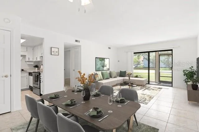 a living room with furniture and a table