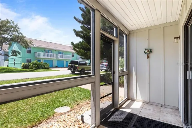 a front view of a house with a porch