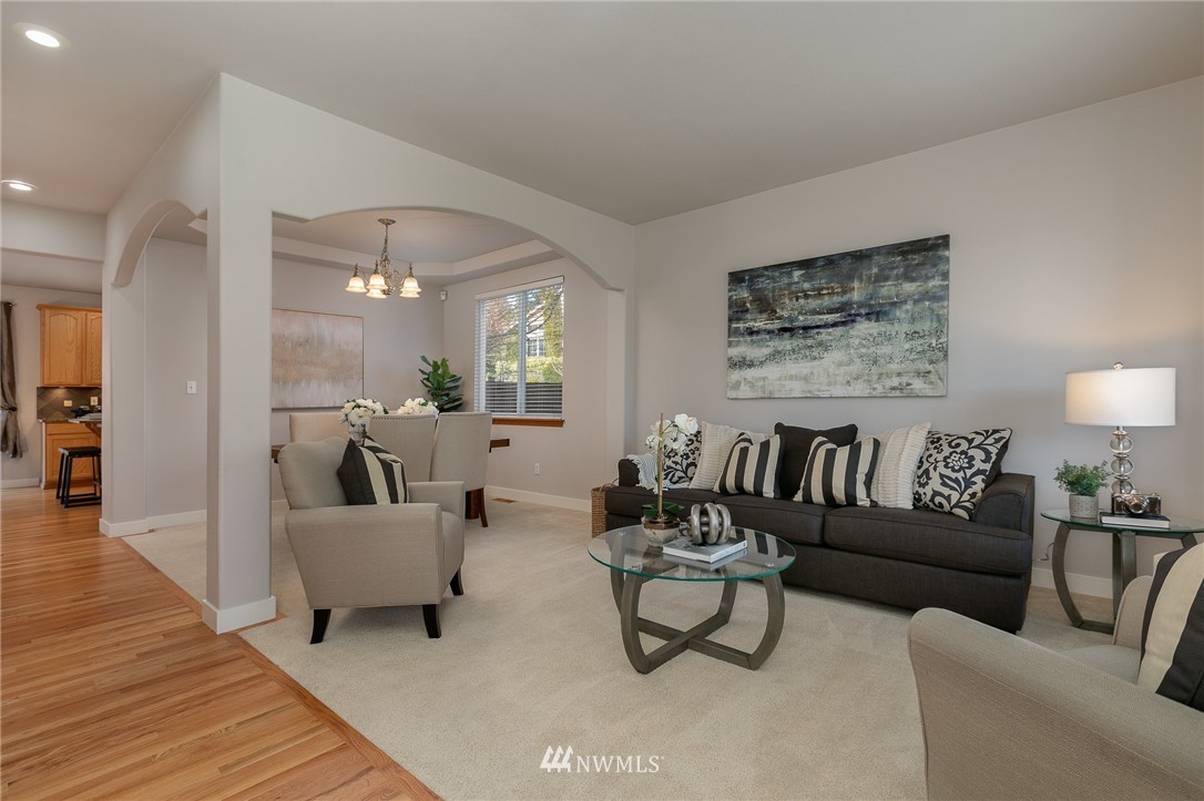 204 203rd Street Southeast Bothell, WA 98012 - Photo 2 of 25 a living room with furniture and wooden floor