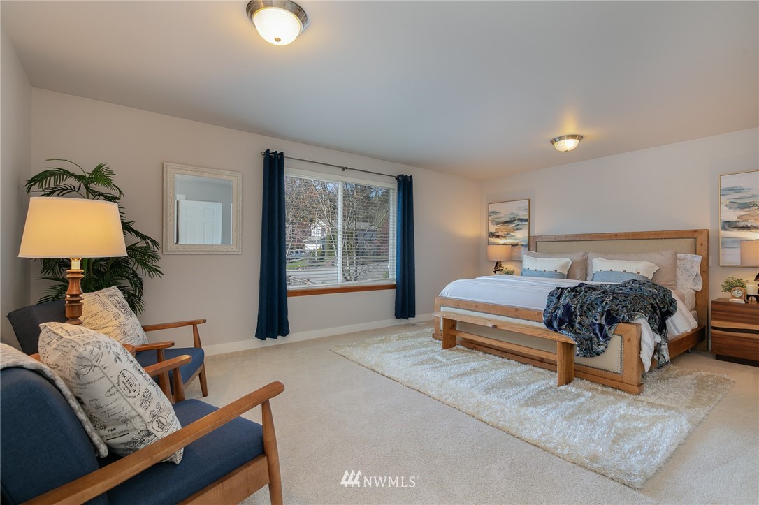 204 203rd Street Southeast Bothell, WA 98012 - Photo 13 of 25 a bedroom with a bed and window