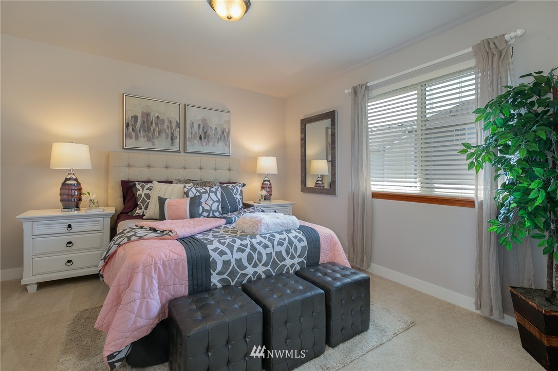 204 203rd Street Southeast Bothell, WA 98012 - Photo 17 of 25 a bedroom with a bed and a window