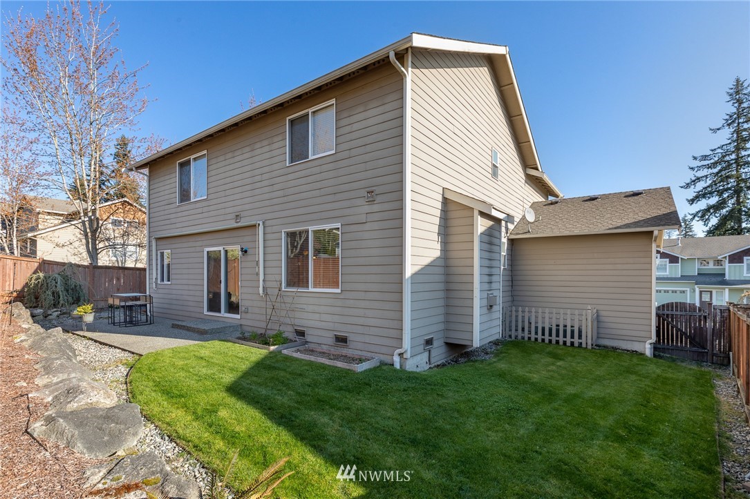 204 203rd Street Southeast Bothell, WA 98012 - Photo 24 of 25 a front view of house with yard and green space