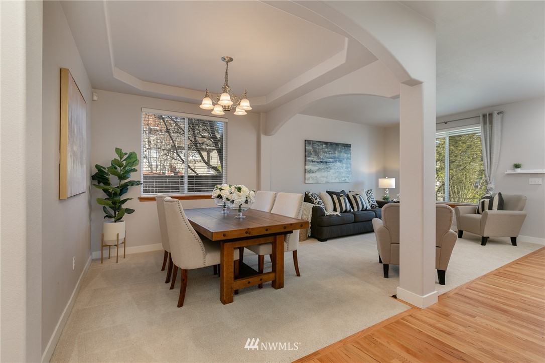 204 203rd Street Southeast Bothell, WA 98012 - Photo 4 of 25 a view of a dining room with furniture and chandelier