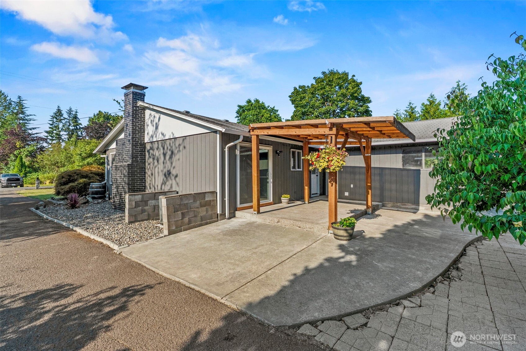 202 Waters Road Castle Rock, WA 98611 - Photo 14 of 38 a view of a house with basketball court