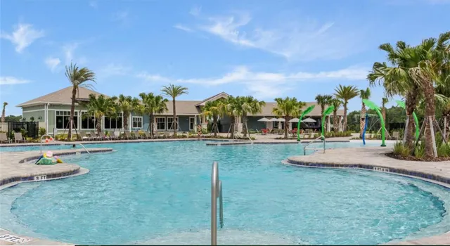 a view of a house with swimming pool