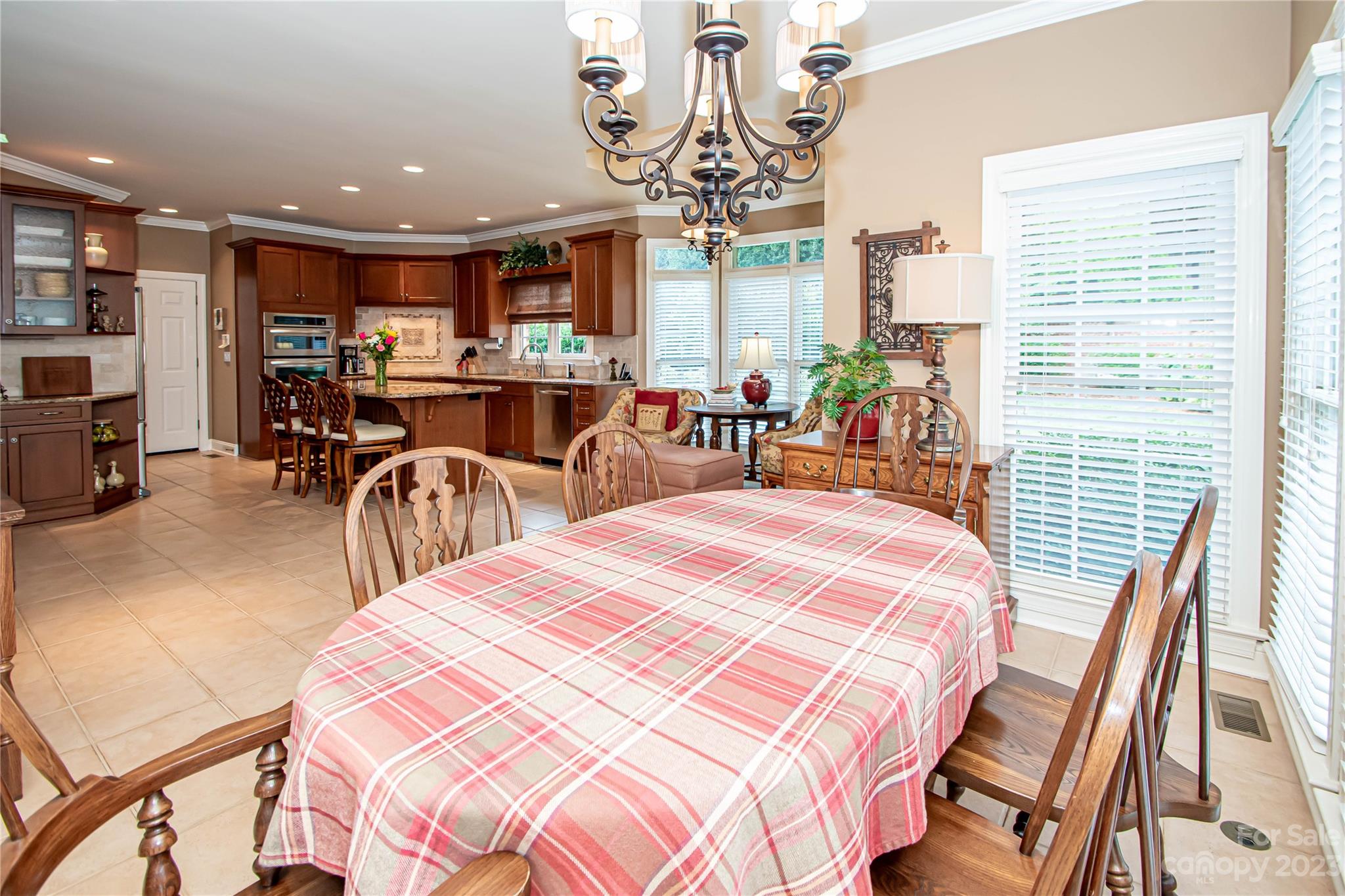 2100 Peterborough Lane Charlotte, NC 28270 - Photo 17 of 48 a bedroom with furniture and a large window