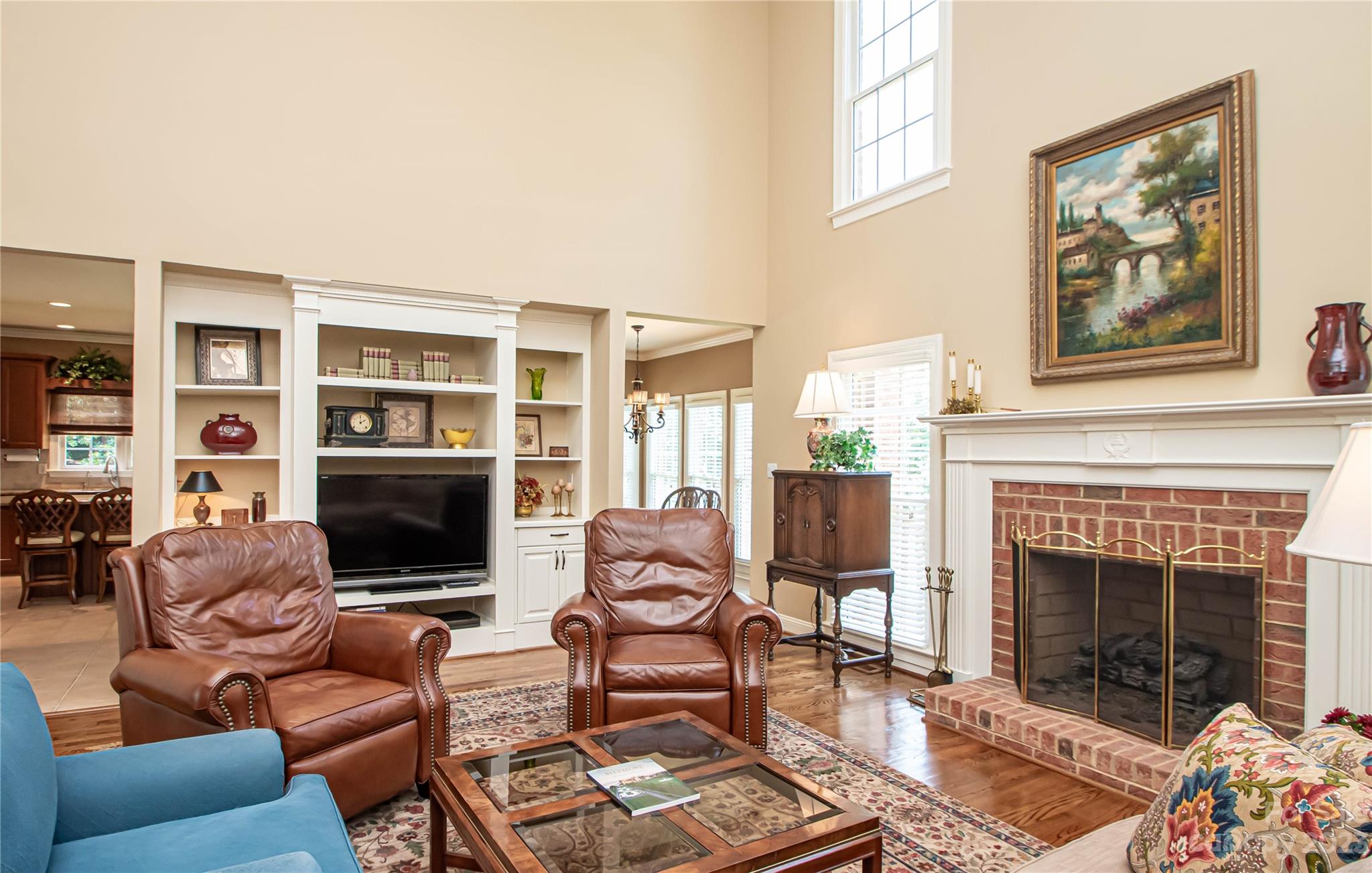 2100 Peterborough Lane Charlotte, NC 28270 - Photo 19 of 48 a living room with furniture a rug and a fireplace