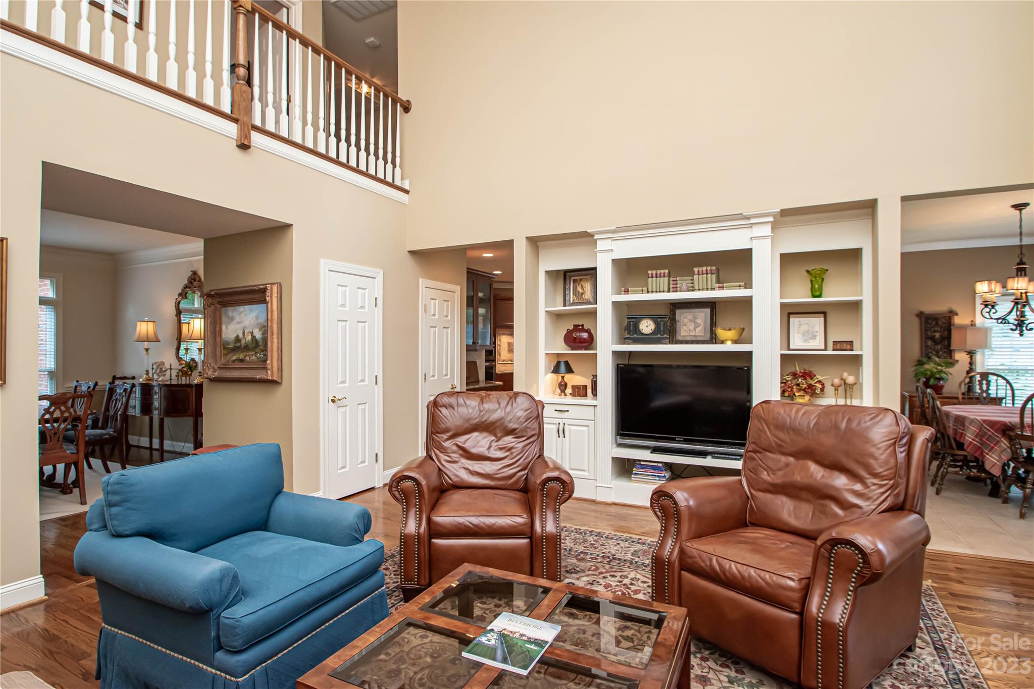 2100 Peterborough Lane Charlotte, NC 28270 - Photo 21 of 48 a living room with furniture a fireplace and a flat screen tv