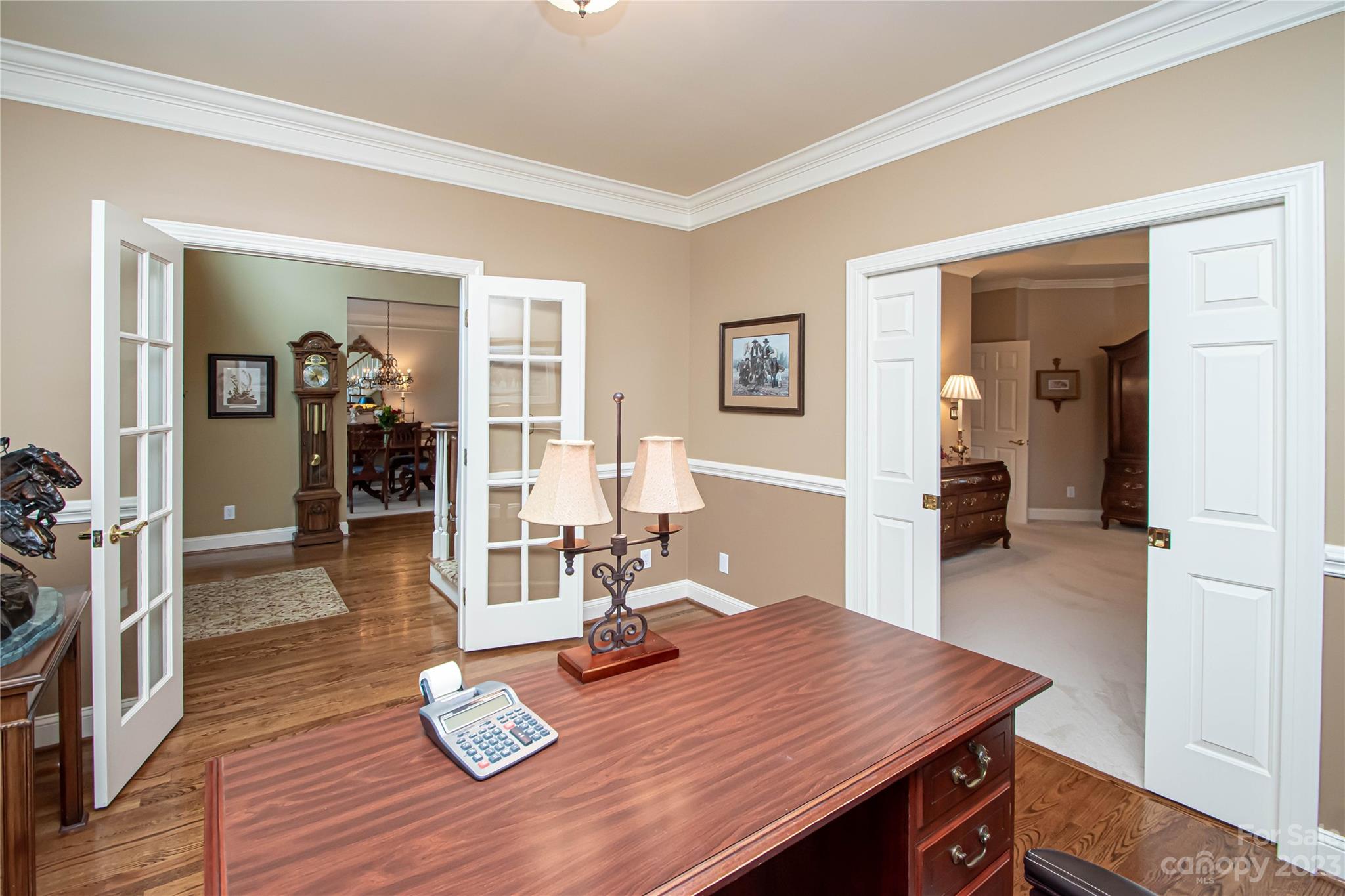 2100 Peterborough Lane Charlotte, NC 28270 - Photo 24 of 48 a view of a dining room with furniture and wooden floor
