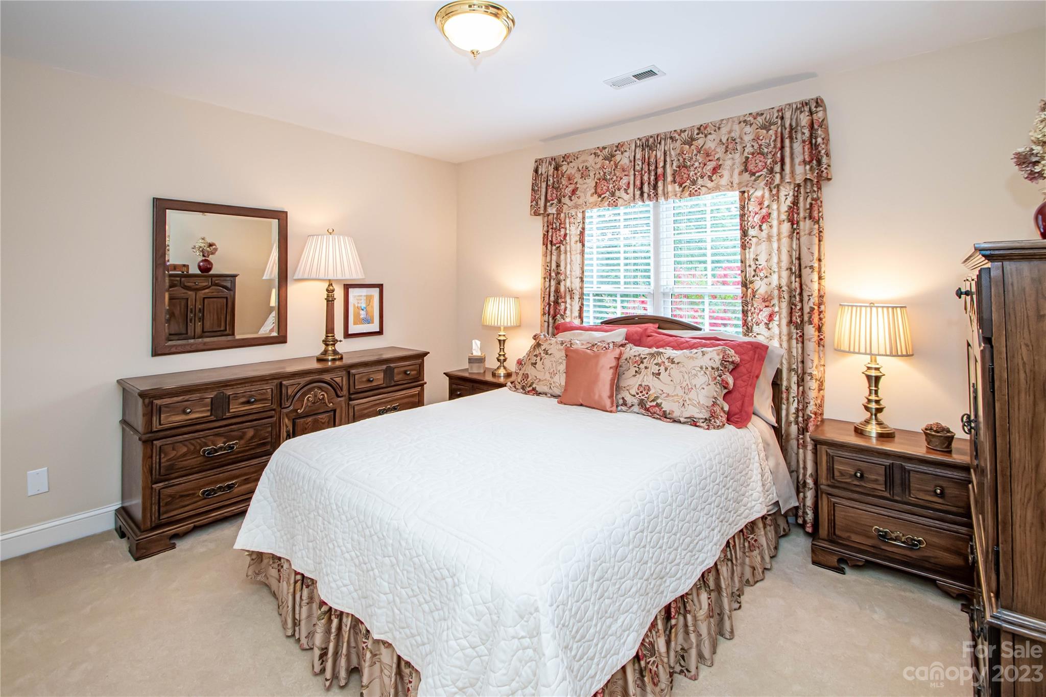 2100 Peterborough Lane Charlotte, NC 28270 - Photo 30 of 48 a bedroom with a bed next to a window