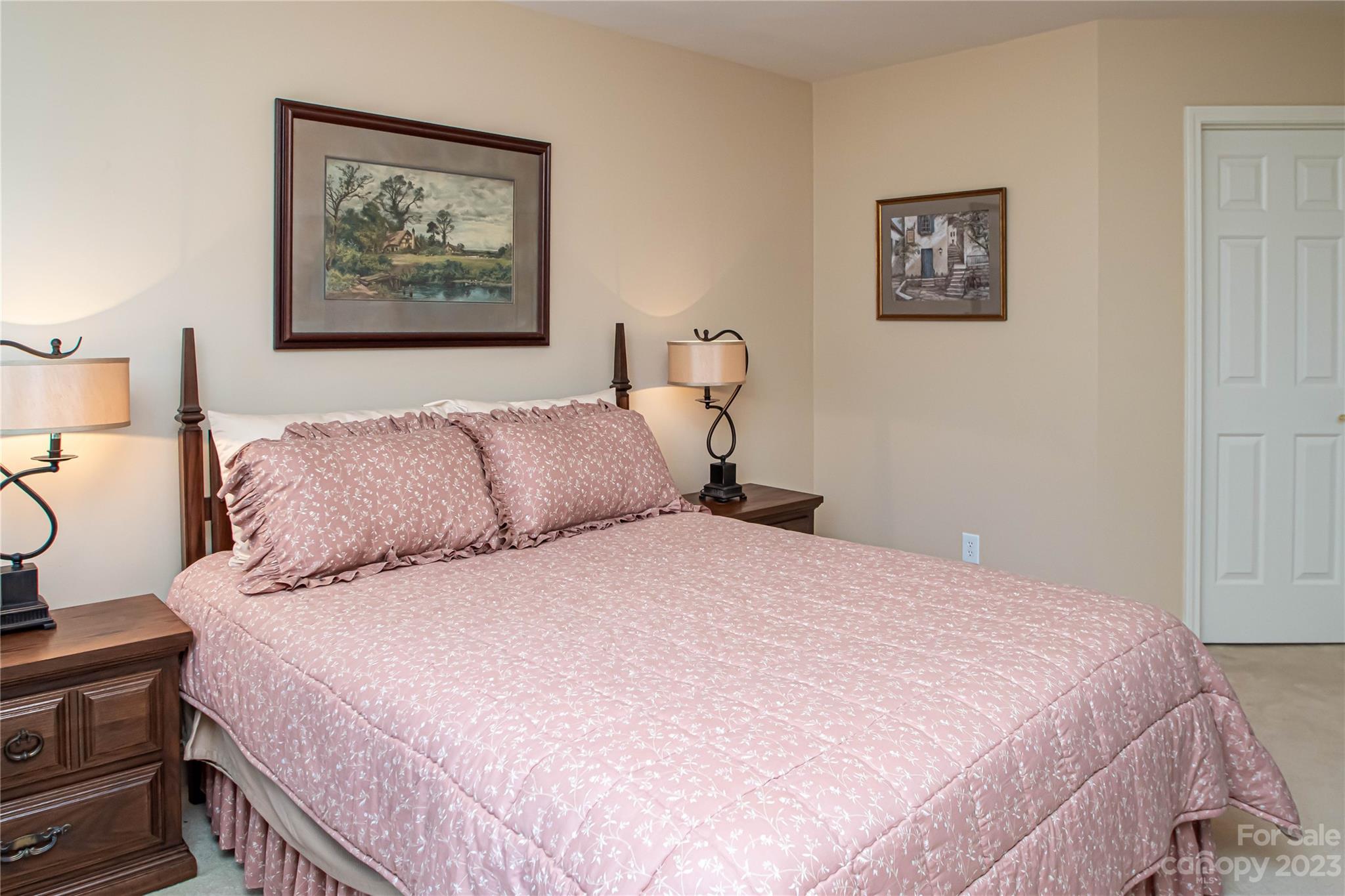 2100 Peterborough Lane Charlotte, NC 28270 - Photo 35 of 48 a bedroom with a bed and wall painting