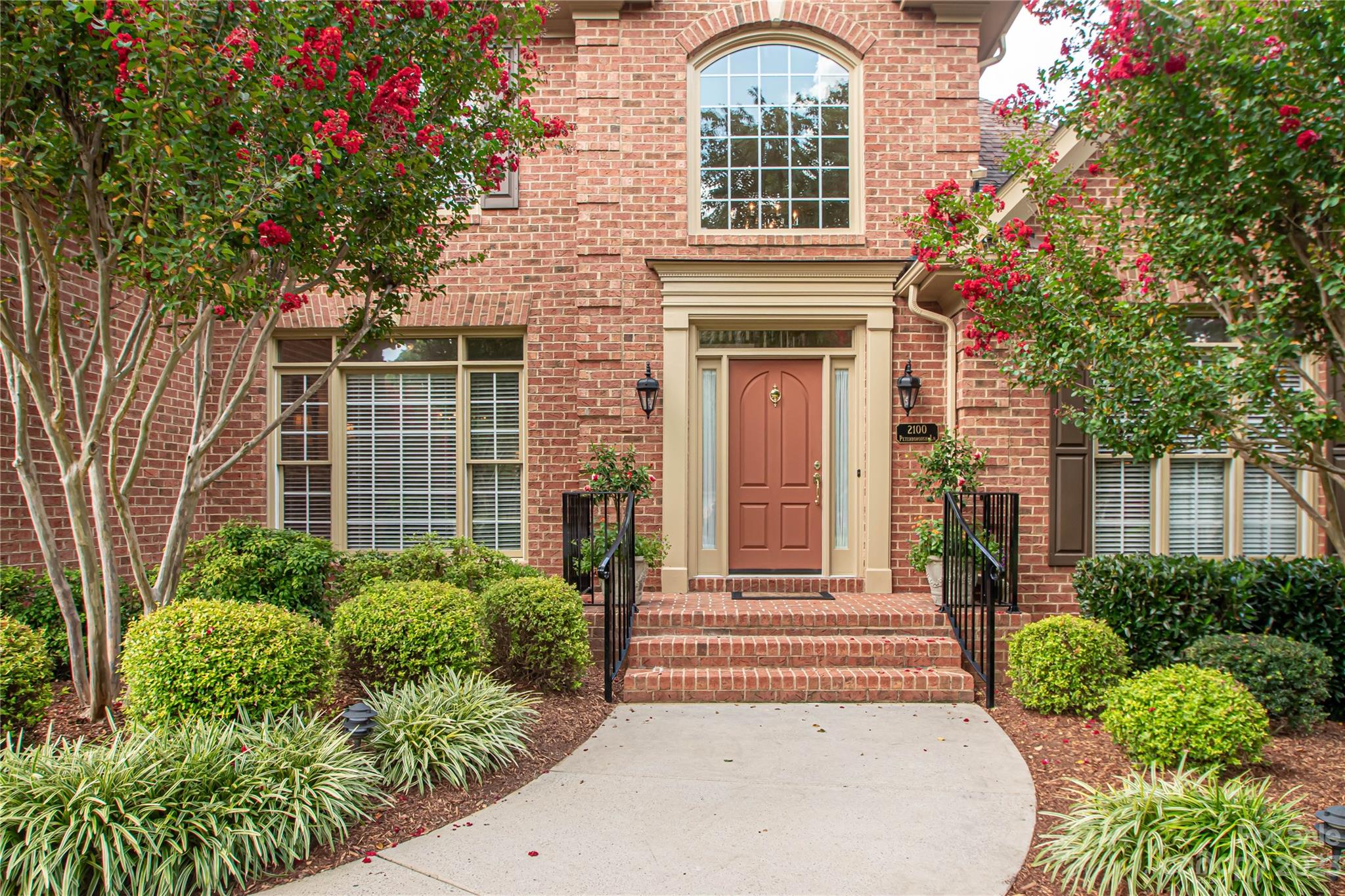 2100 Peterborough Lane Charlotte, NC 28270 - Photo 4 of 48 a front view of a house with a yard