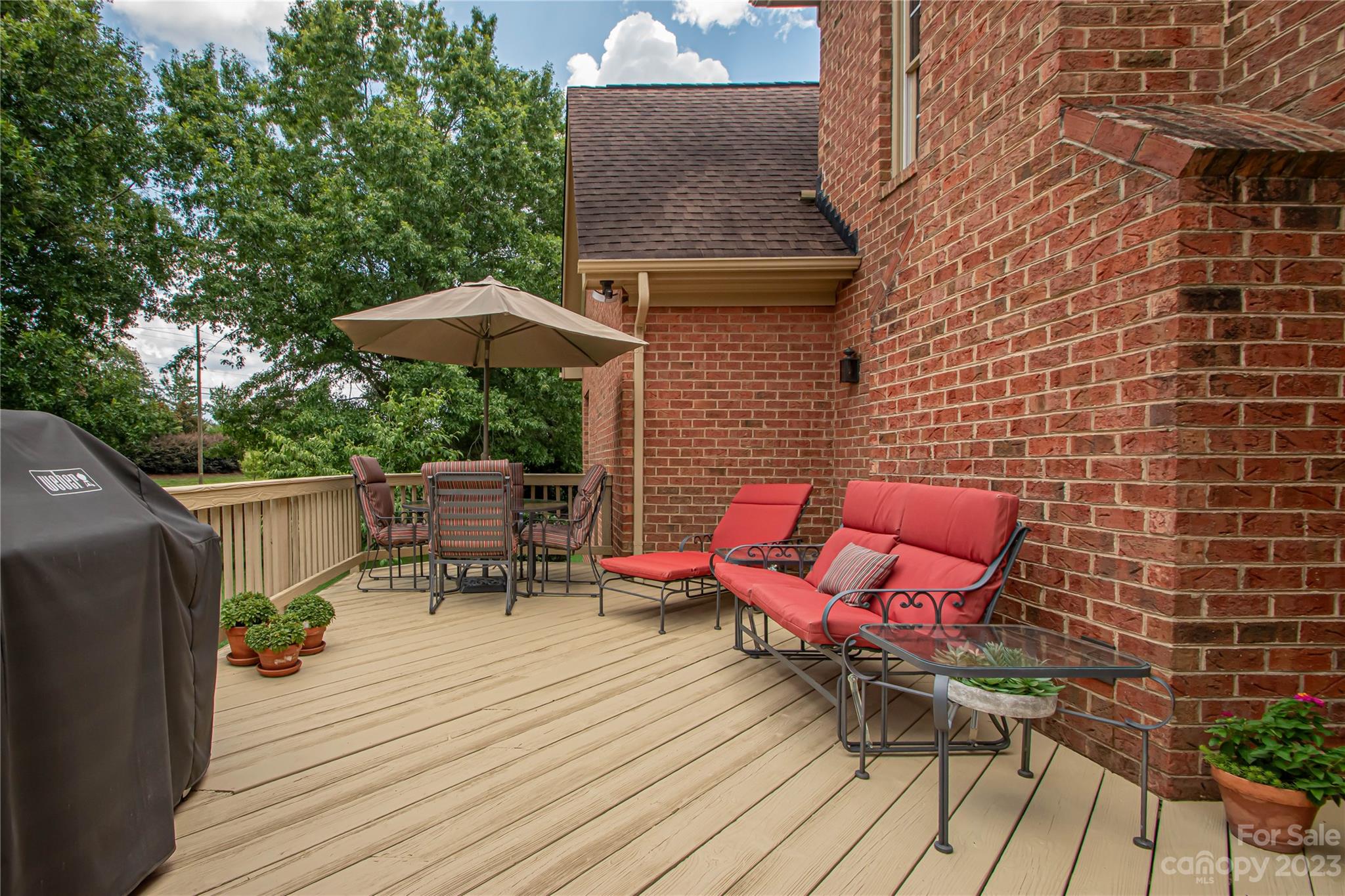2100 Peterborough Lane Charlotte, NC 28270 - Photo 43 of 48 a patio with table and chairs