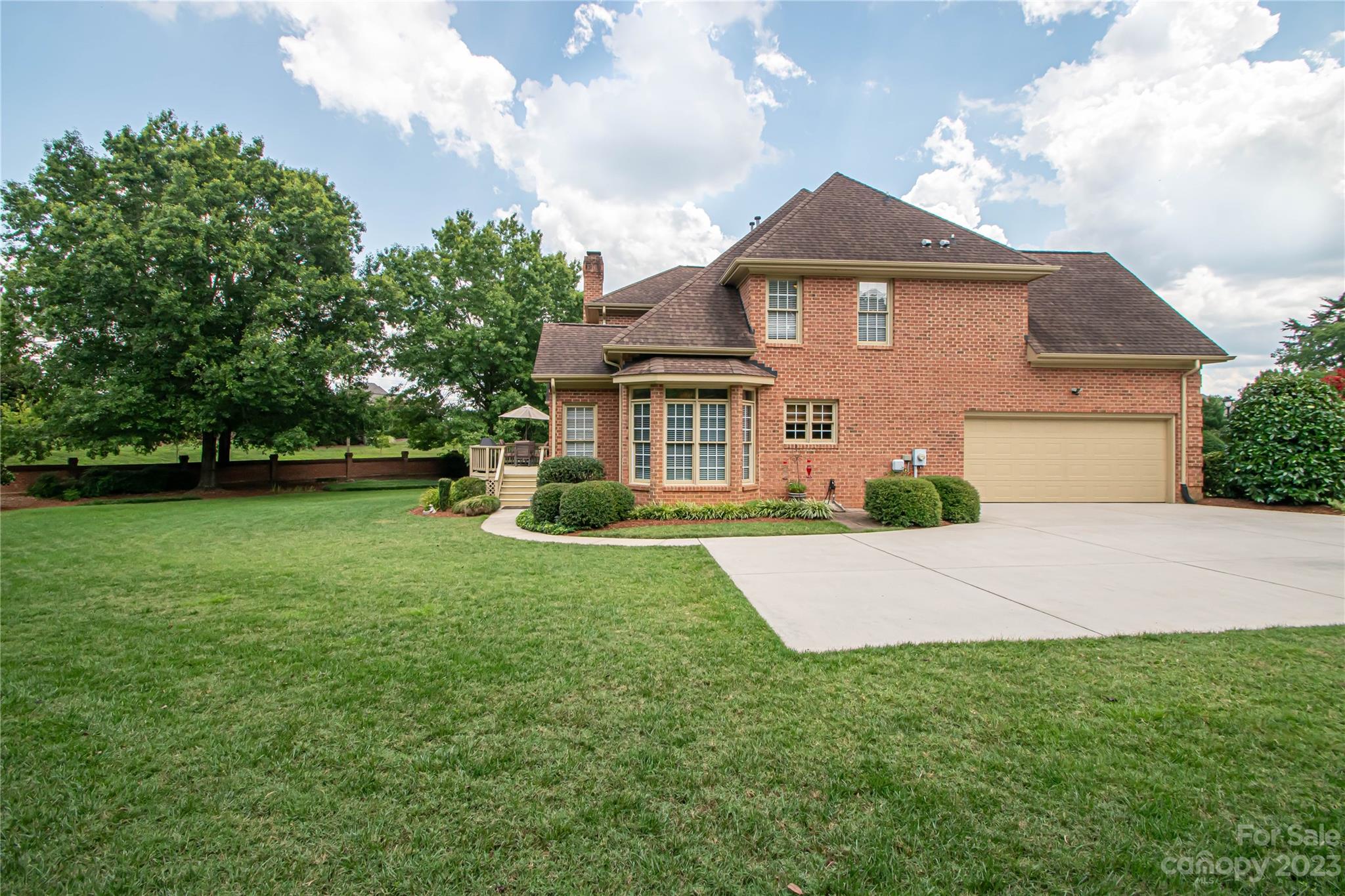 2100 Peterborough Lane Charlotte, NC 28270 - Photo 45 of 48 a front view of a house with a yard