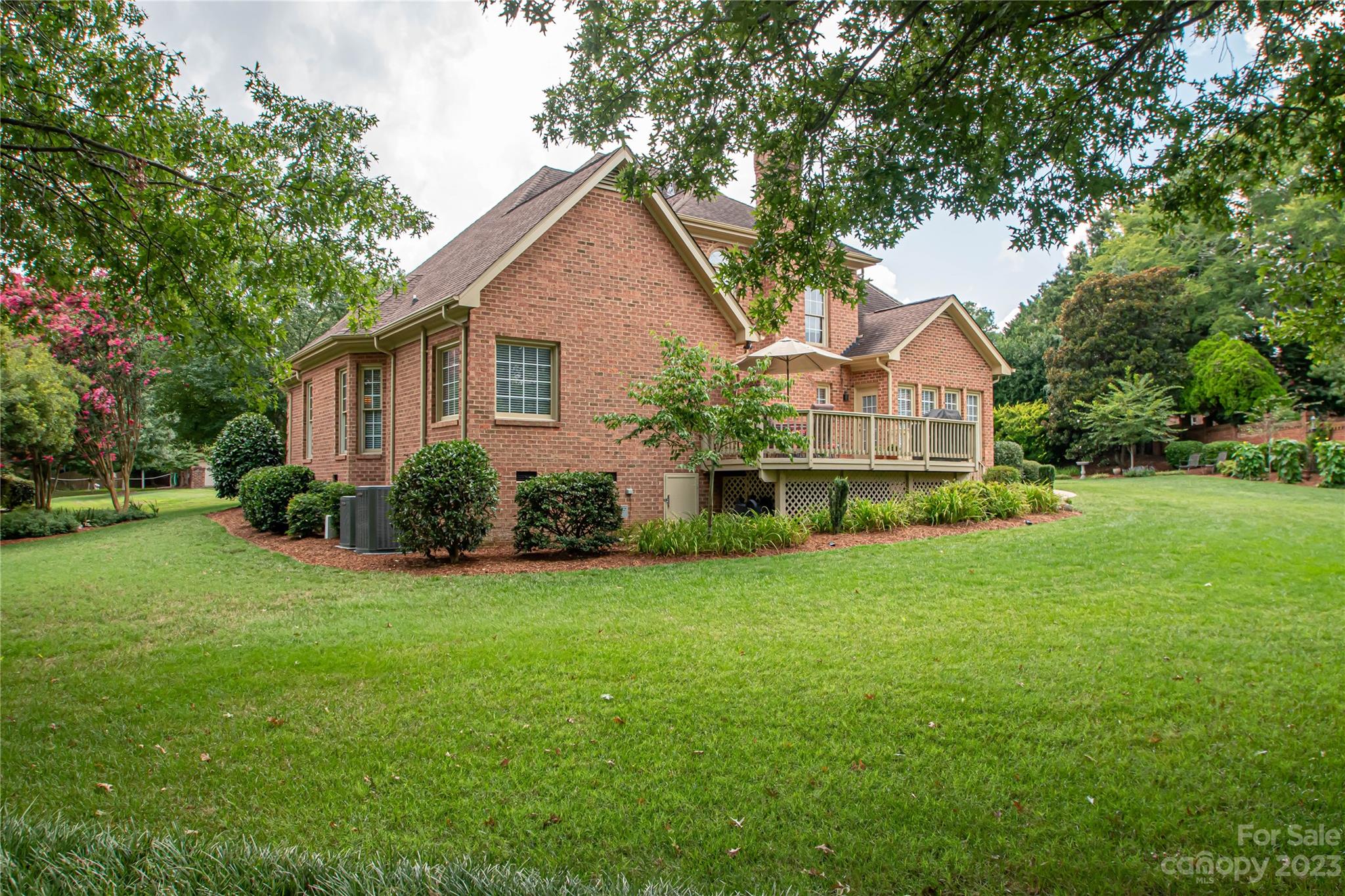 2100 Peterborough Lane Charlotte, NC 28270 - Photo 46 of 48 a front view of a house with yard and green space