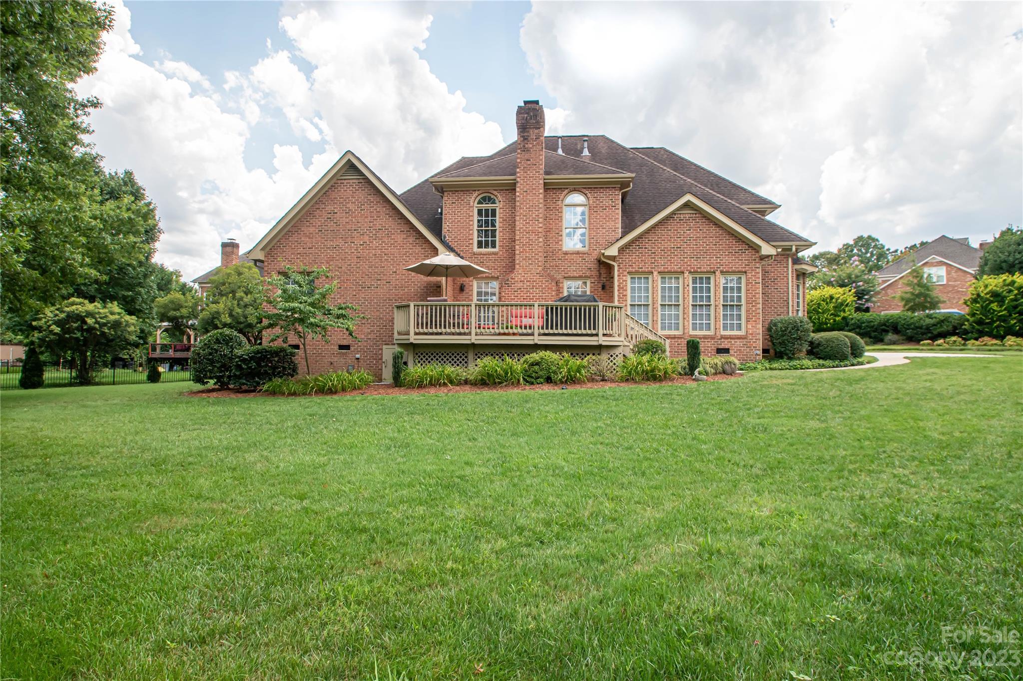 2100 Peterborough Lane Charlotte, NC 28270 - Photo 47 of 48 a front view of a house with a yard
