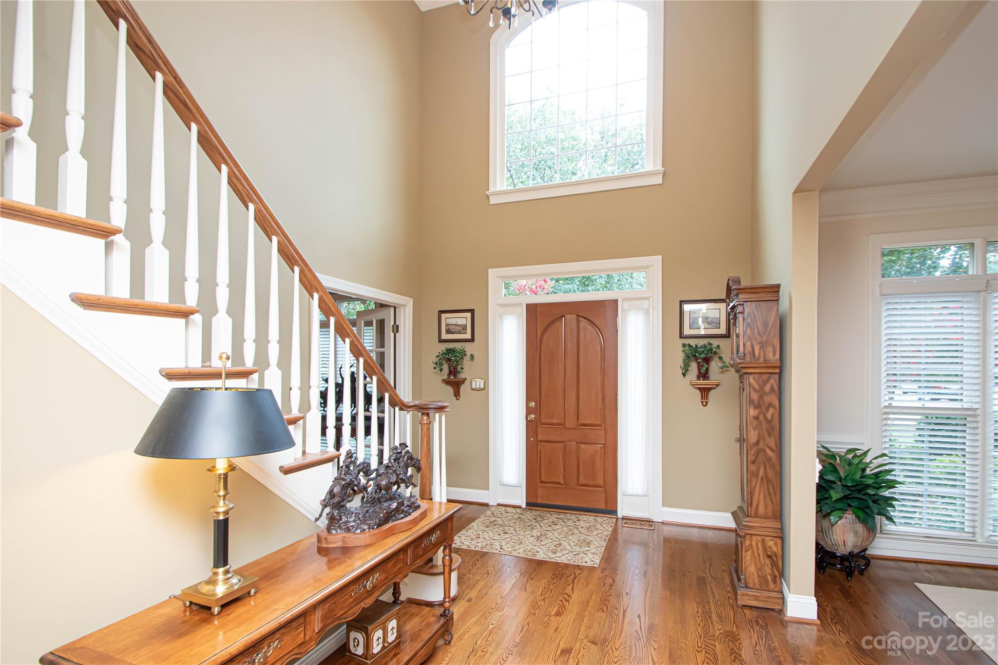 2100 Peterborough Lane Charlotte, NC 28270 - Photo 6 of 48 a living room with furniture and a wooden floor
