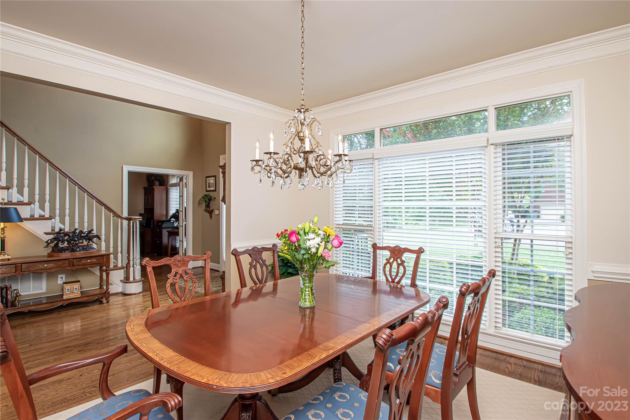 2100 Peterborough Lane Charlotte, NC 28270 - Photo 10 of 48 a view of a dining room with furniture and chandelier