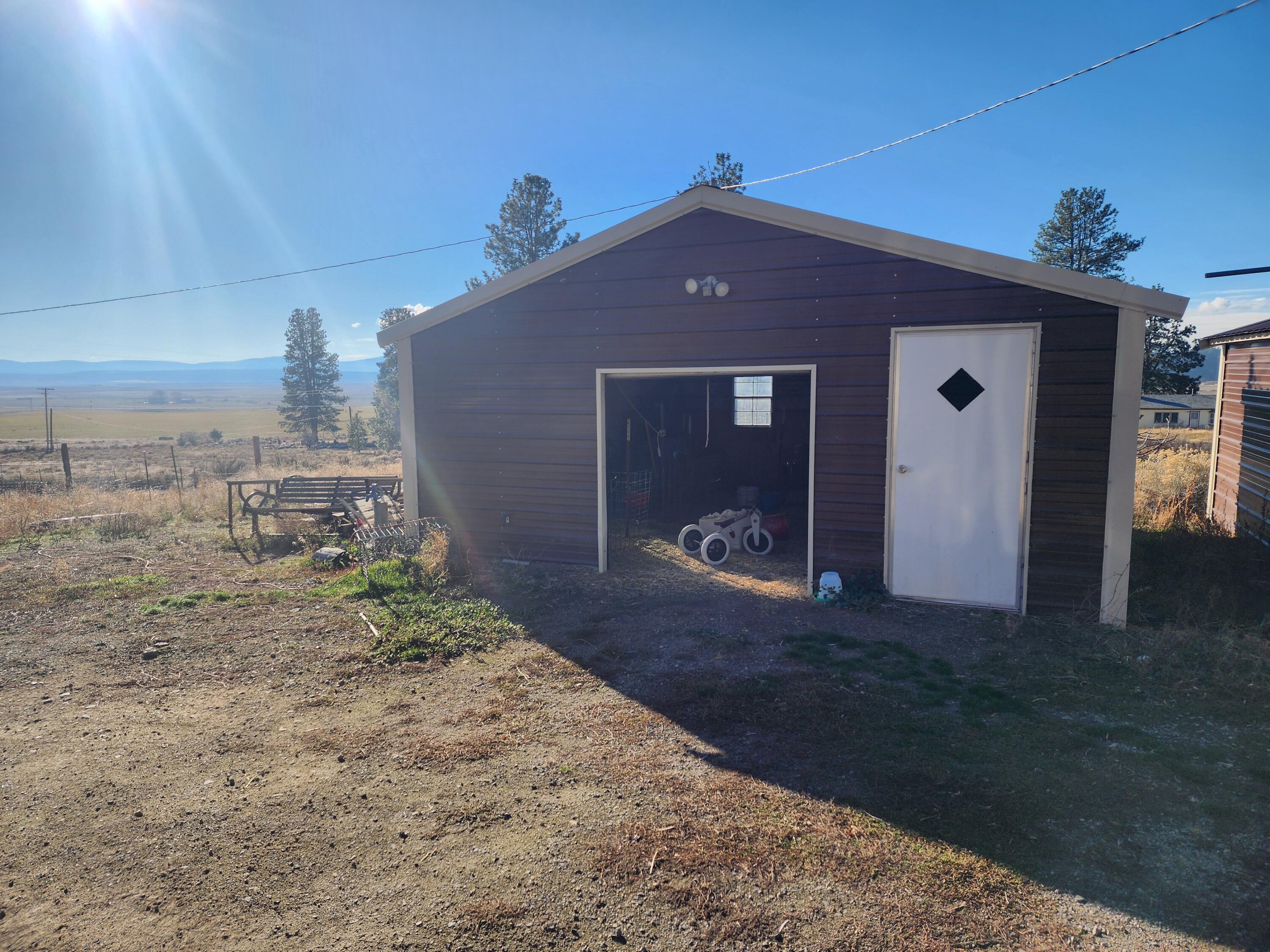 29151 Beatty Drive Beatty, OR 97621 - Photo 3 of 16 a front view of a house with a yard