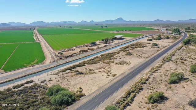 a view of a field with a big yard
