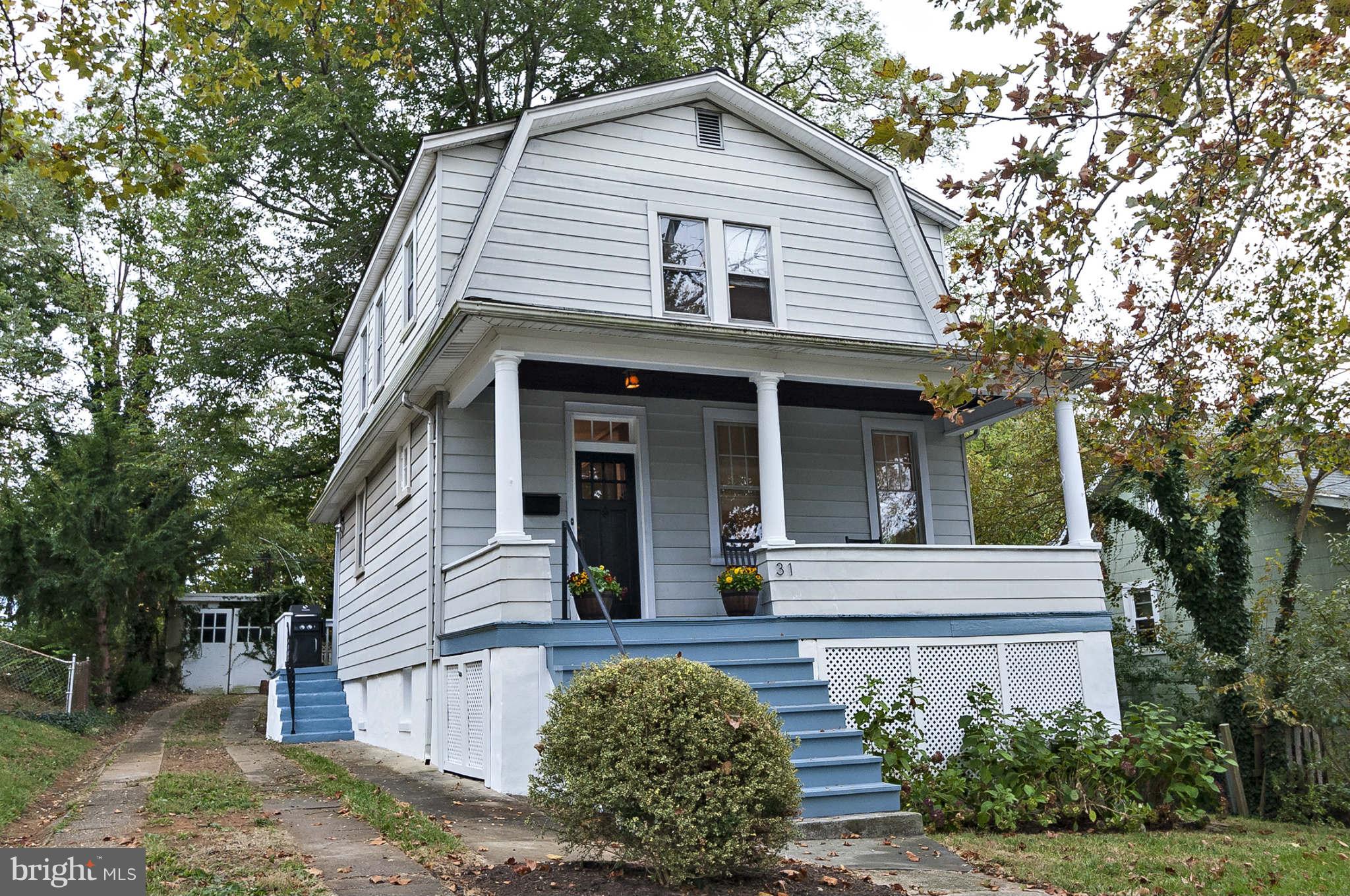31 Edmondson Ridge Road Baltimore, MD 21228 - Photo 1 of 22 a front view of a house with garden