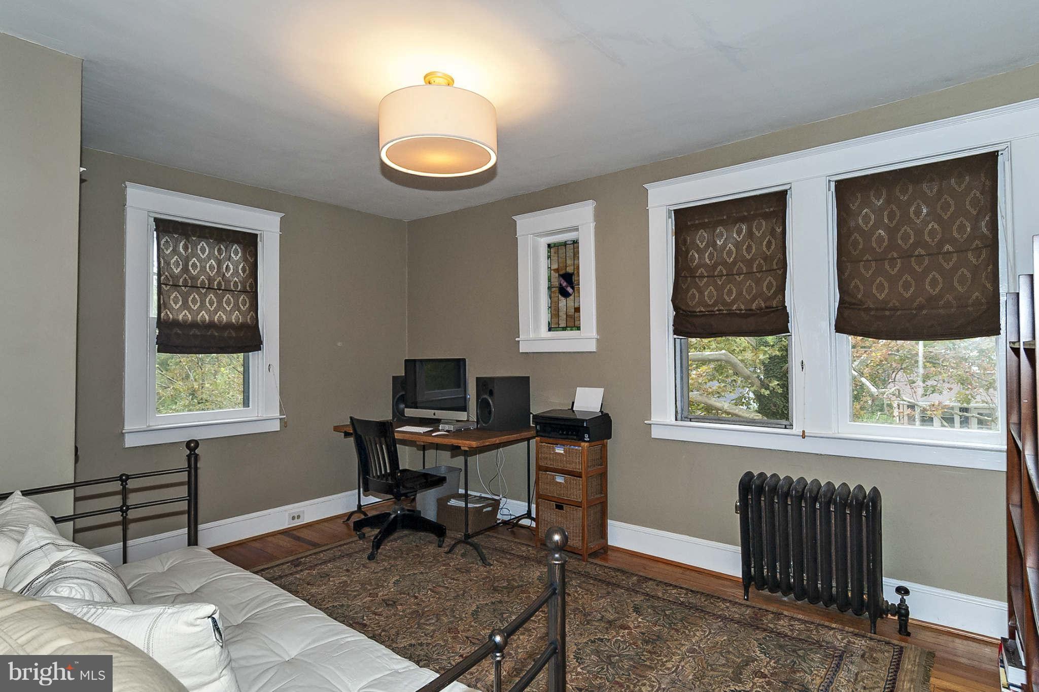 31 Edmondson Ridge Road Baltimore, MD 21228 - Photo 17 of 22 a view of a livingroom with workspace and a window
