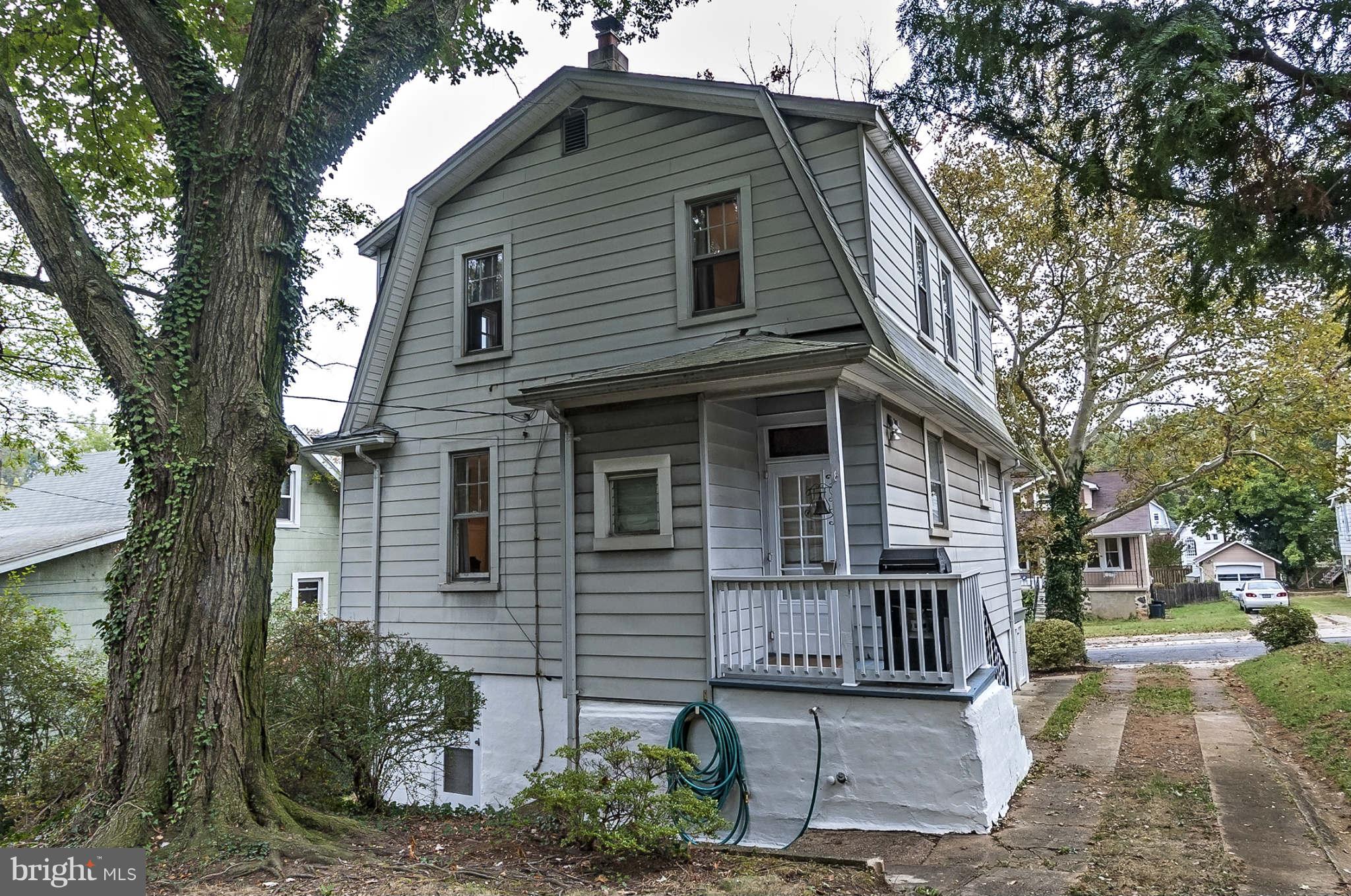 31 Edmondson Ridge Road Baltimore, MD 21228 - Photo 22 of 22 a front view of a house with a garden