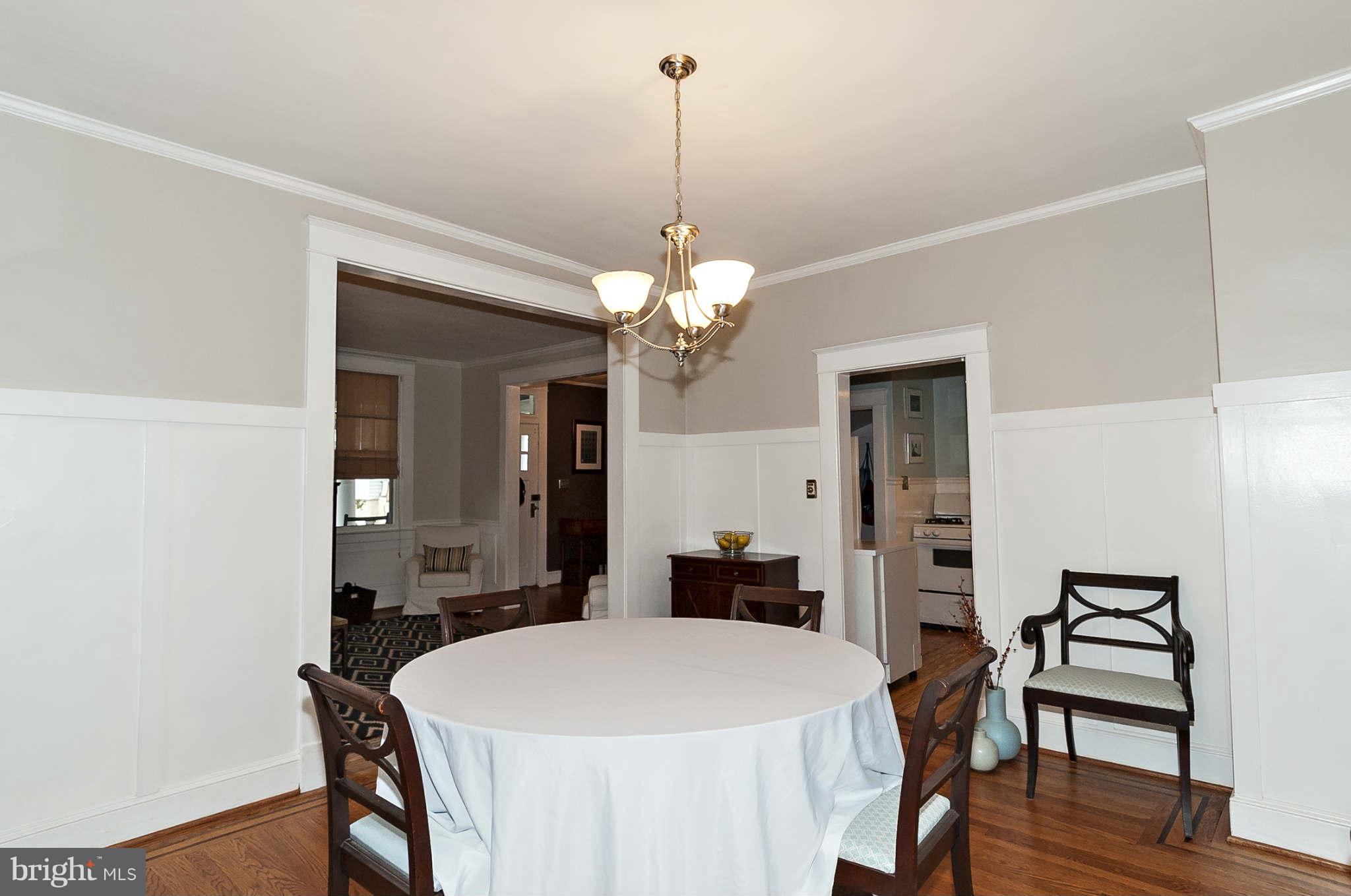 31 Edmondson Ridge Road Baltimore, MD 21228 - Photo 7 of 22 a view of a dining room with furniture and wooden floor
