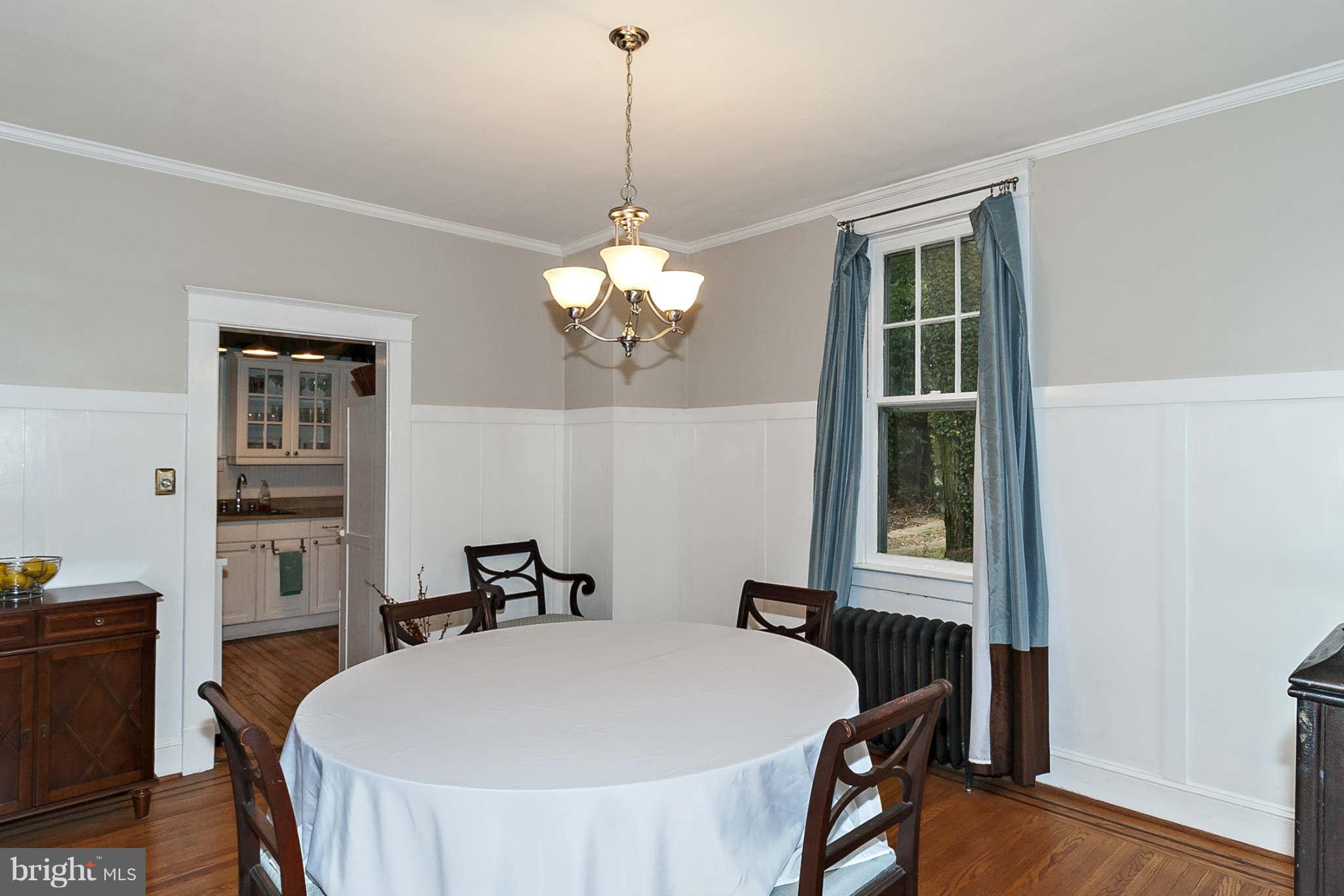 31 Edmondson Ridge Road Baltimore, MD 21228 - Photo 8 of 22 a view of a dining room with furniture and wooden floor