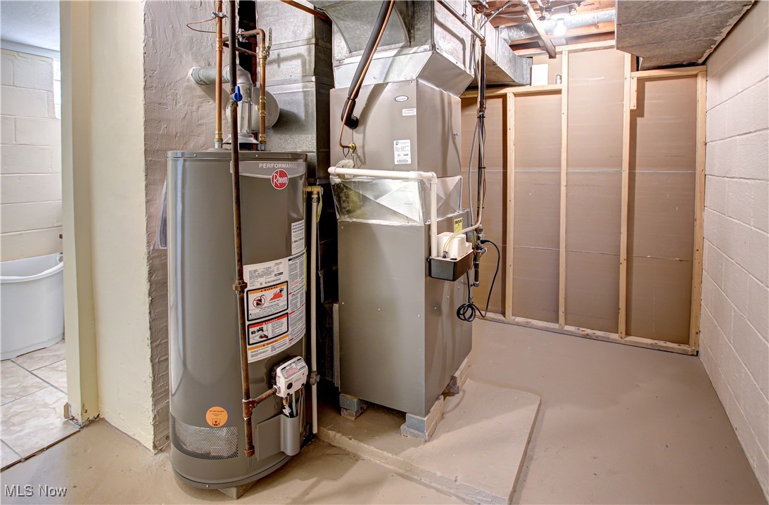 4234 Grafton Road Brunswick, OH 44212 - Photo 26 of 40 Utility room featuring water heater and heating unit