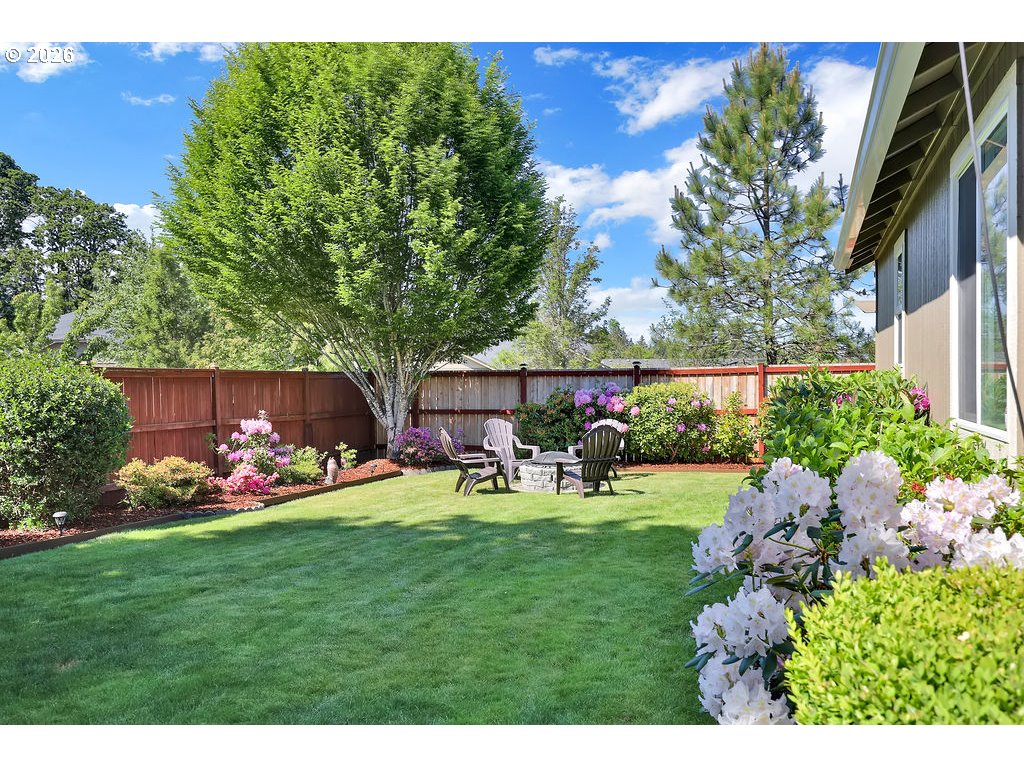 87836 8th Street Veneta, OR 97487 - Photo 12 of 25 a view of an house with backyard space and garden