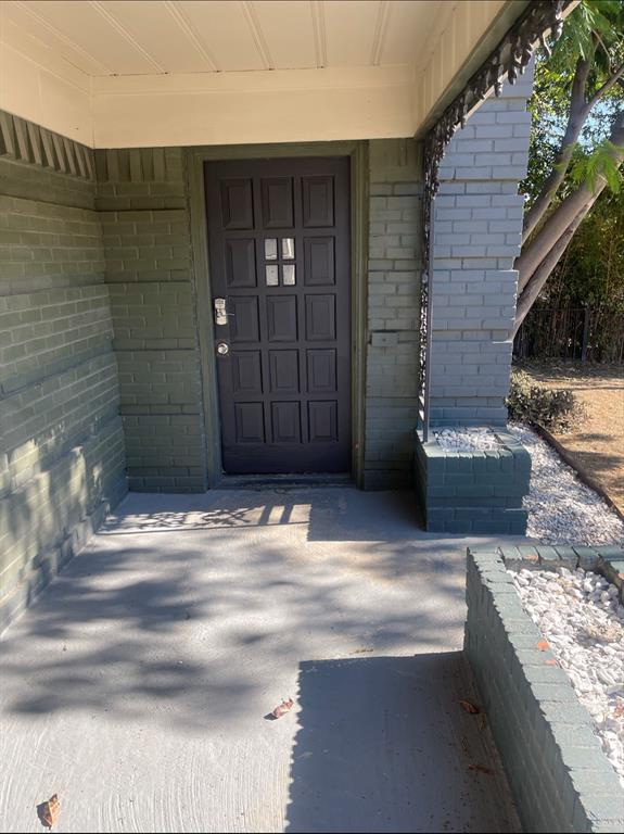 4815 Live Oak Street, Unit 10 Dallas, TX 75204 - Photo 3 of 13 Property entrance with brick siding