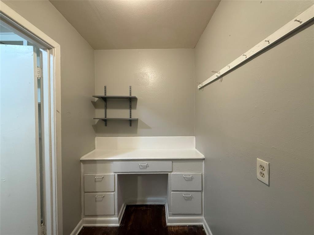 4815 Live Oak Street, Unit 10 Dallas, TX 75204 - Photo 9 of 13 Unfurnished office featuring baseboards and dark wood finished floors
