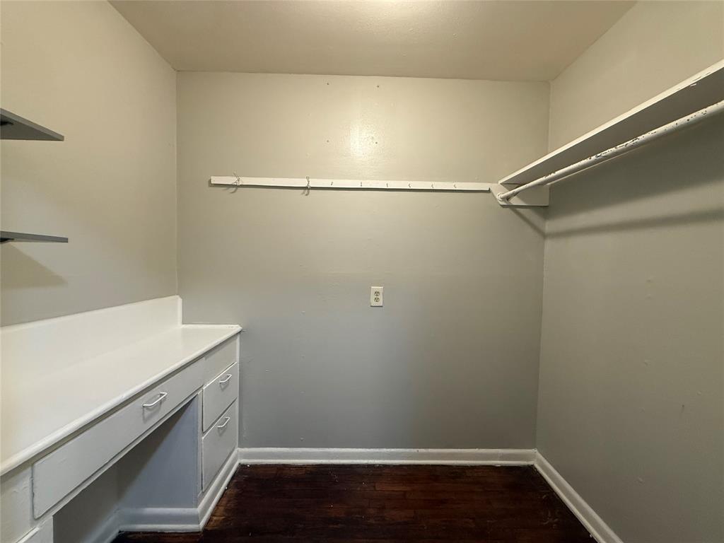 4815 Live Oak Street, Unit 10 Dallas, TX 75204 - Photo 10 of 13 Walk in closet featuring dark wood-style flooring