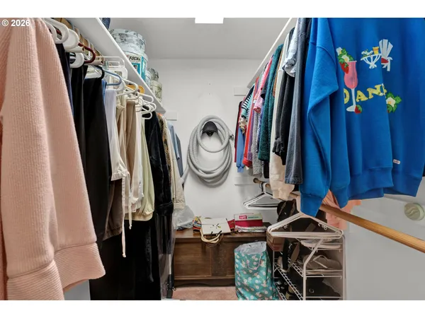 a view of a closet with storage